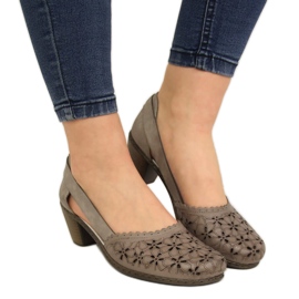 Dampumps i beige genombrutna läder Rieker 40986