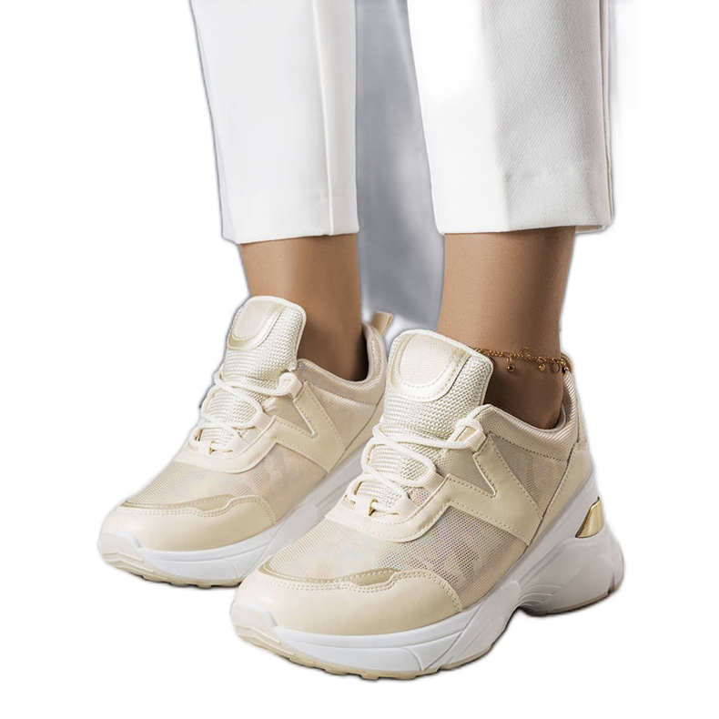 Beige sneakers med metallic-inlägg från Ruais