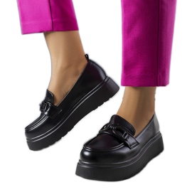 Svarta herrar dekorerade med en Gagnon-kil