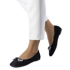 Svarta ballerinor med en Gaillou-rosett