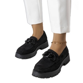 Svarta herrar prydda med en Arpin-kedja