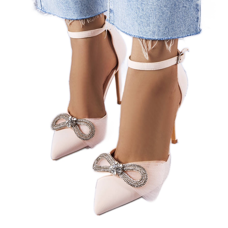 Beige stift med rosett och cubic zirconias från Bussi