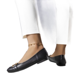 Svarta ballerinor med gulddekor från Iris