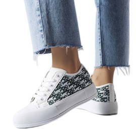 Vita sneakers med grönt markismönster