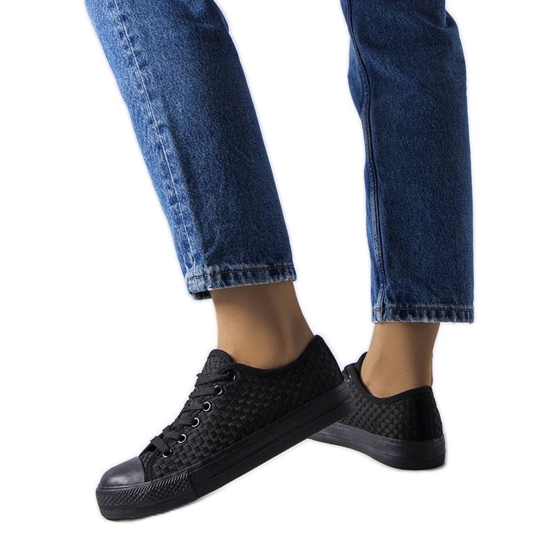 Svarta sneakers i vävt tyg från Thibodeau