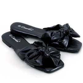 Minnen Svarta rosetttofflor