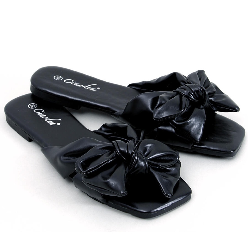 Minnen Svarta rosetttofflor