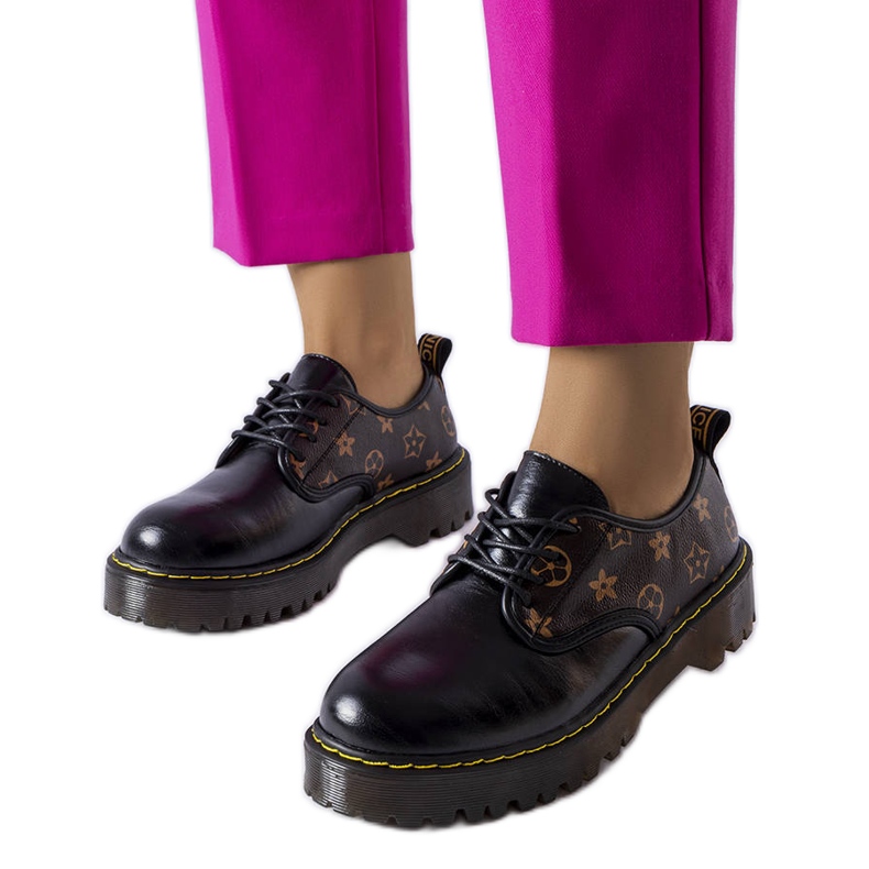 Eugenia svarta stövlar med bruna inlägg