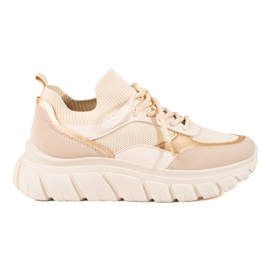 Kvinnors beige sneakers på en tjock sula Shelovet