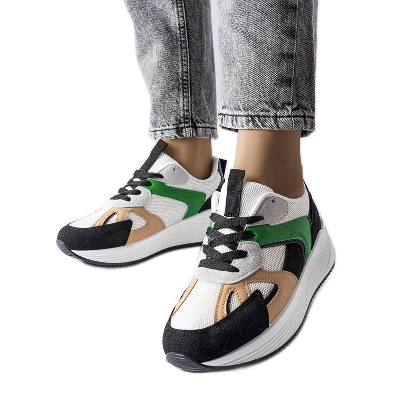 Svarta sneakers i blandade material från Riel vit