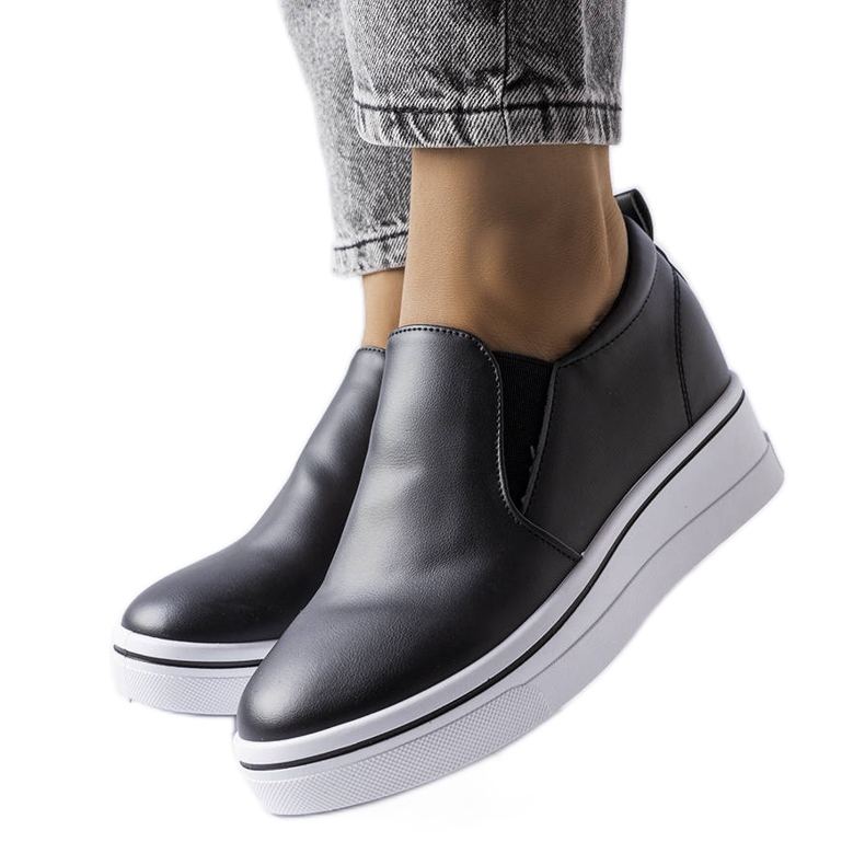 BM Svarta slip-on wedge sneakers från Francoeur
