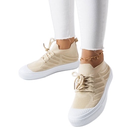 Beige sneakers i stretchtyg från Polaire