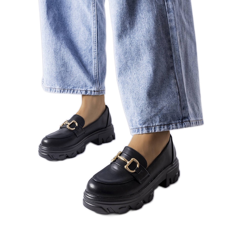 Svarta brogues med spänne från Mason