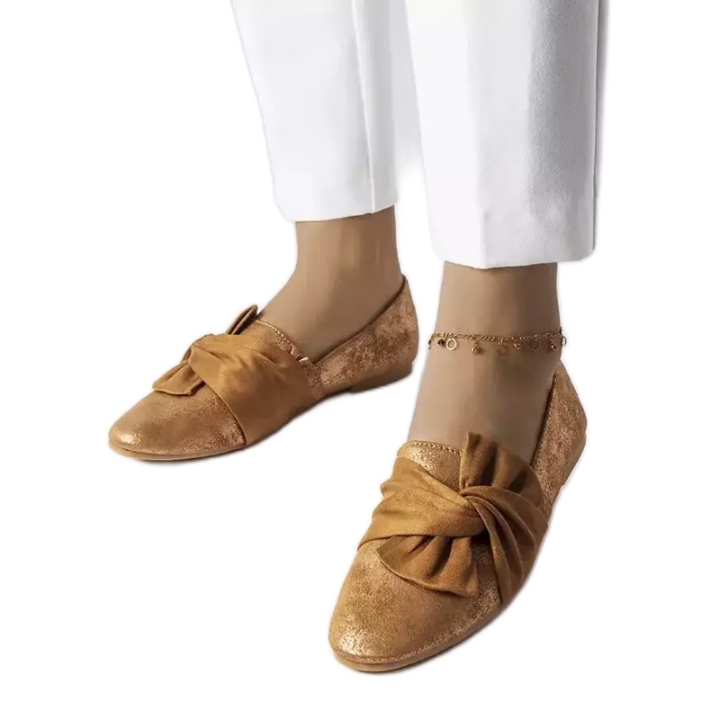 Bruna metalliska ballerinor med rosett från Dodier gyllene