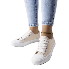 Vinjettvita glänsande sneakers beige