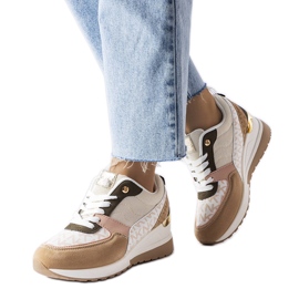 Beige sneakers med dekorativa inlägg från Mireault