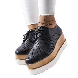 Svarta genombrutna kilskor från Laurent