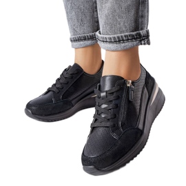 Svarta genombrutna läderskor från Fleur