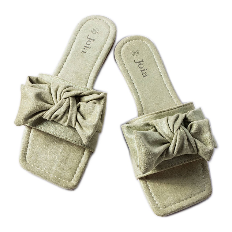 Gröna eleganta reglage med rosett från Thériault