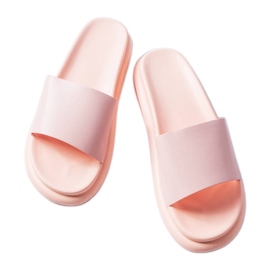 Rosa tofflor på Paquette-plattformen