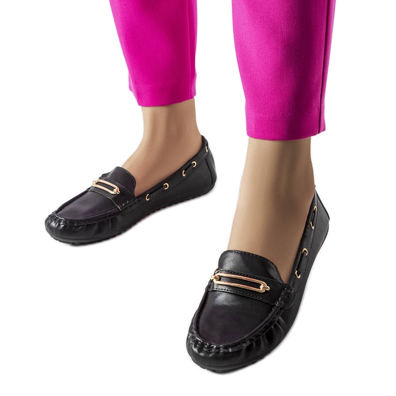 Svarta loafers dekorerade med Seattle-applikationen