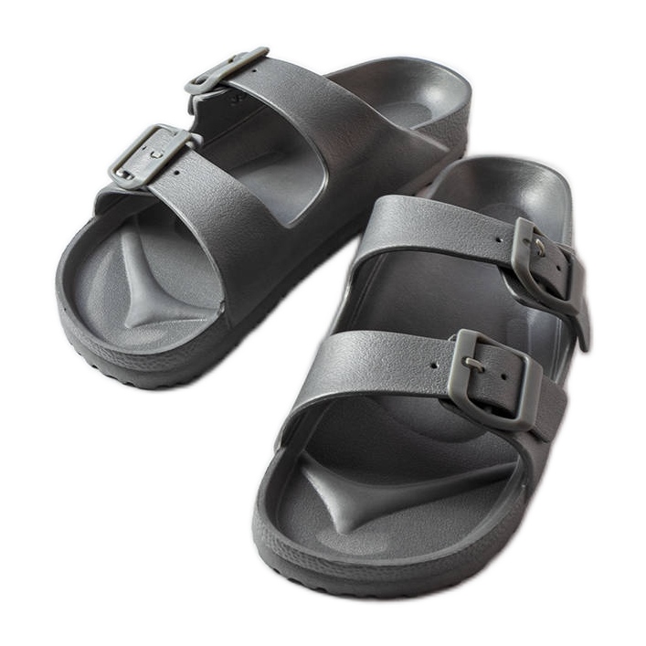 Grå gummireglage med spännen från Eugene