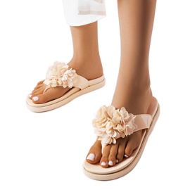 Beiga flipflops dekorerade med Caresse-blommor beige