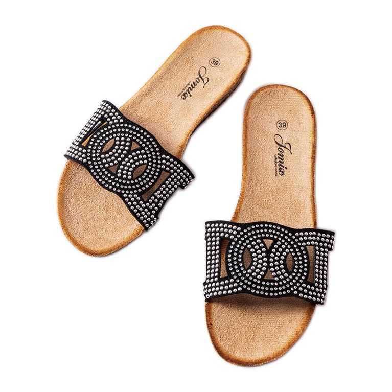 Svarta rutschbanor dekorerade med Lagacé-strålar