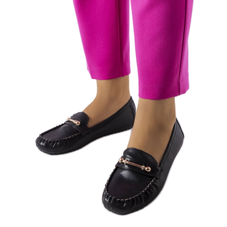 Svarta loafers med matt finish från Sorel