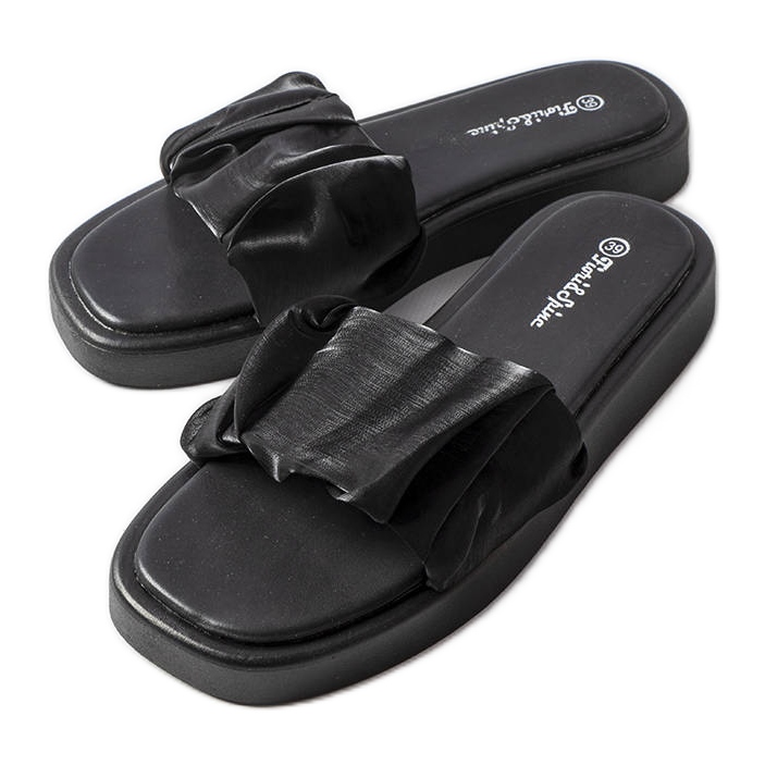 Boulevard volangiga svarta rutschbanor