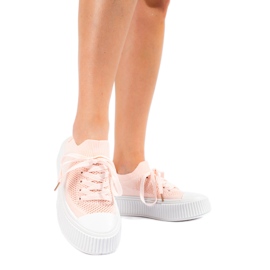 Rosa genombrutna sneakers på Shelovet-plattformen