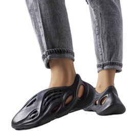 Julienne svarta skumglas