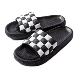 Svarta plattformstofflor i gummi från Elin