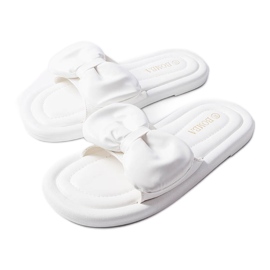 Vita tofflor med rosett från Lende