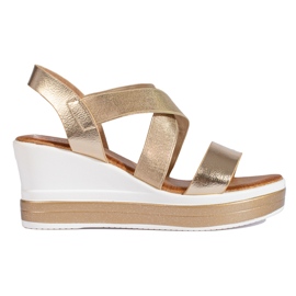 Shelovet kilasandaler i guld gyllene