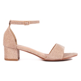 Eleganta glittersandaler med en lågklackad Shelovet guld gyllene