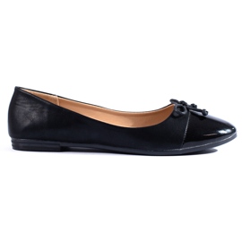 Klassiska svarta balettlägenheter med en Shelovet-rosett