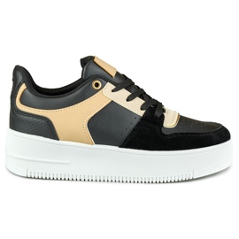 Fashionabla svarta sportskor för kvinnor