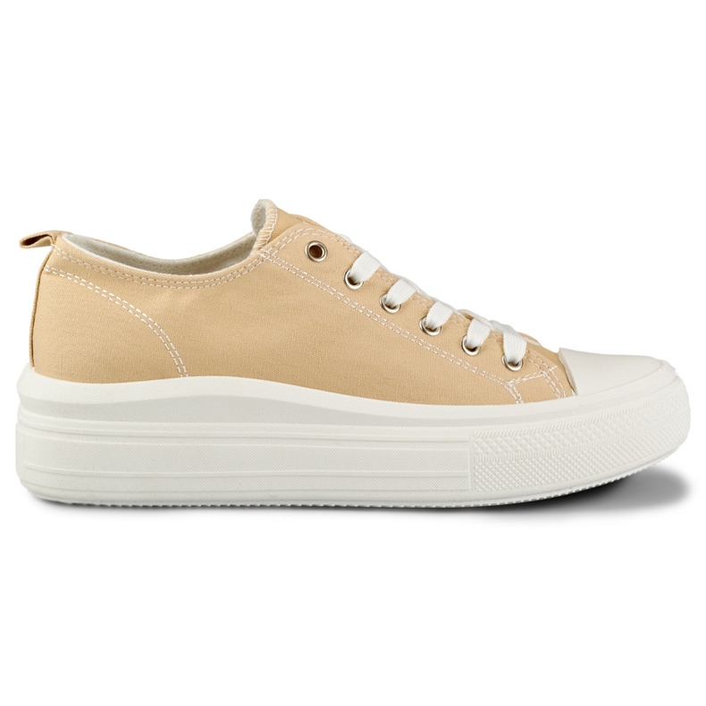 Beige sneakers på låg plattform