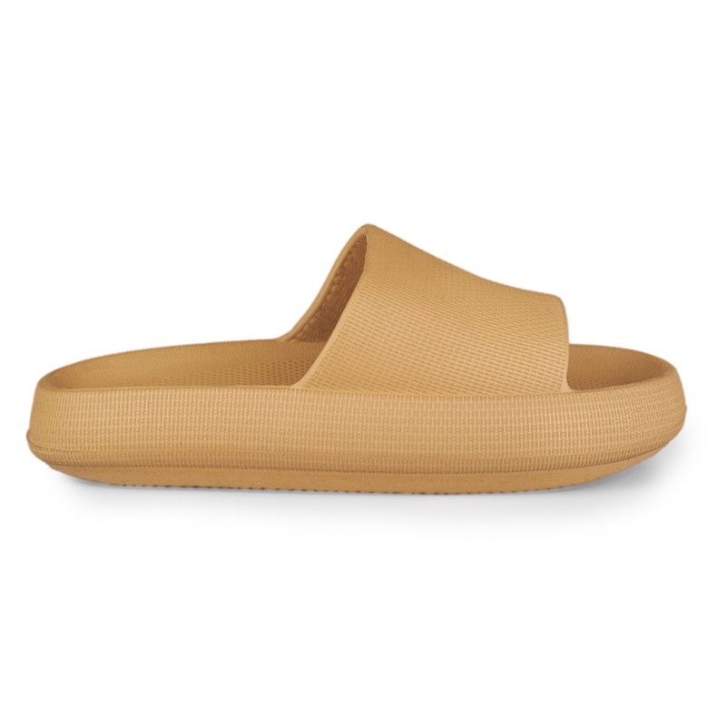 Bekväma beige damtofflor gjorda av skum