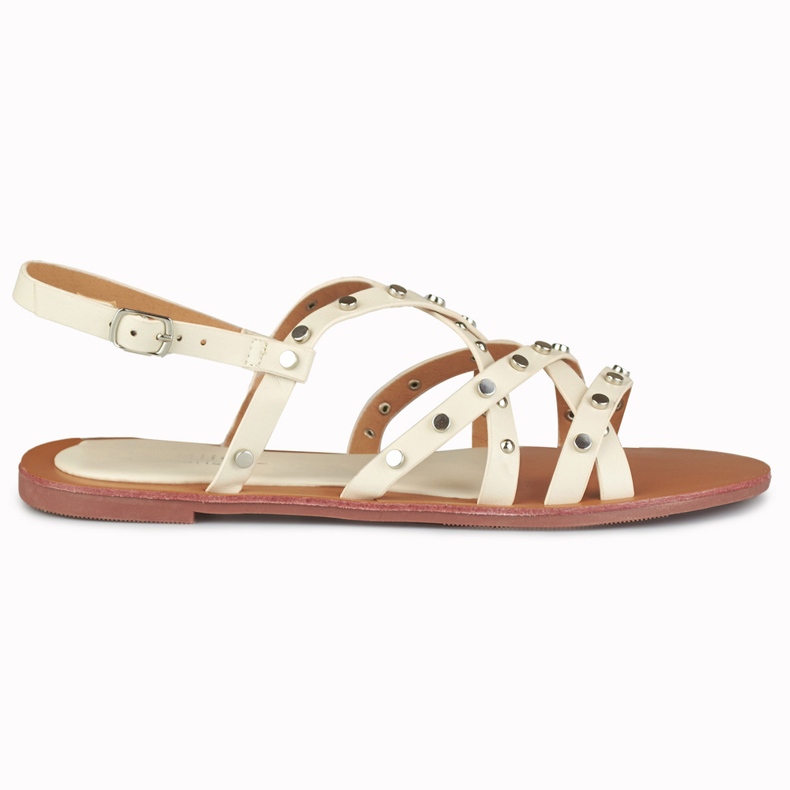 Beige damsandaler med metalldekorationer