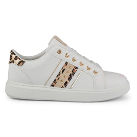 Vita damsportskor med en delikat dekoration