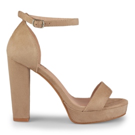 Beige sandaler med höga anklar