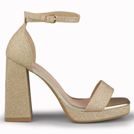 Guldblanka sandaler på bred hög klack gyllene