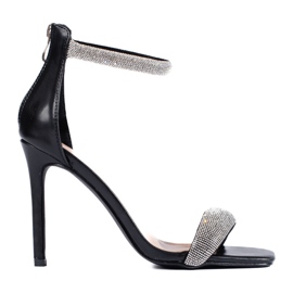 Eleganta sandaler på en högklackad Shelovet svart