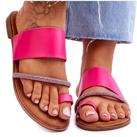 Kvinnors flip -flops med en dekorativ fuchsia -remsa rosa