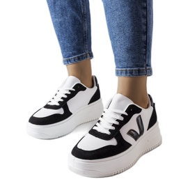 Svarta och vita platåsneakers från Plouffe