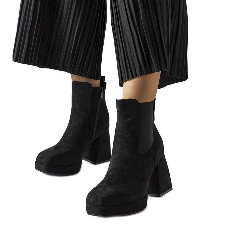 Provins svarta stövlar i ekomocka