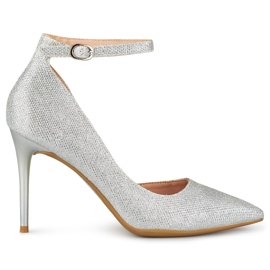 Glänsande silvernålar fästa vid ankeln silver-