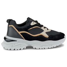 Svarta damsneakers på vit sula